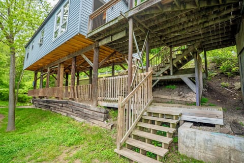 Access to the upper cabins is via the outdoor  wooden stairs shown here