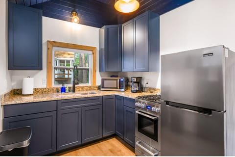 Delight in cooking with modern appliances and chic design that inspire culinary adventures during your Traverse City escape!