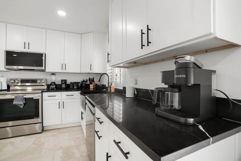 Full kitchen, Complete with modern appliances, cookware, and utensils