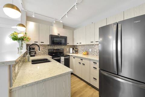 Newly renovated kitchen with loads of counter space for your inner chef! 