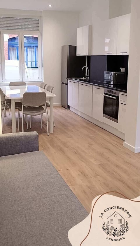 Salon vue sur la cuisine