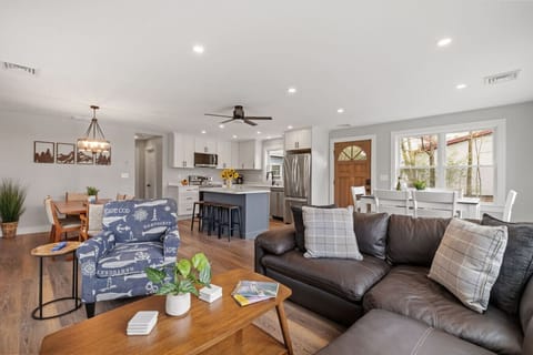 Enjoy modern comfort with connected living, dining, and kitchen spaces