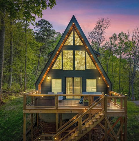 Your A-frame cabin retreat awaits, offering a peaceful, picturesque haven where every detail is designed for relaxation.
