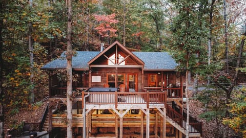 Unwind on the private back porch with breathtaking sunrise/sunset views.