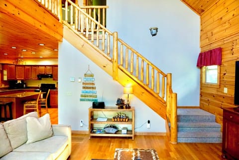 Tranquility Cabin: View of the space from the living room going upstairs.