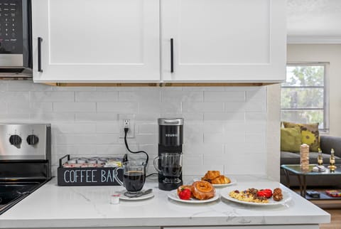 The heart of the home, this modern full kitchen is fully stocked and thoughtfully designed to meet all your culinary needs.