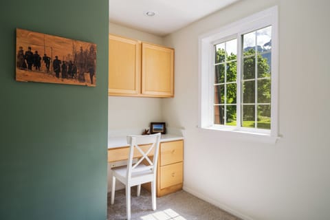 A peaceful place to work or reflect — with serene views of trees and river! 