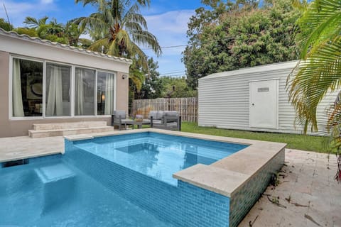 Unwind in Style: Enjoy the Refreshing Hot Tub in Your Private Tropical Haven