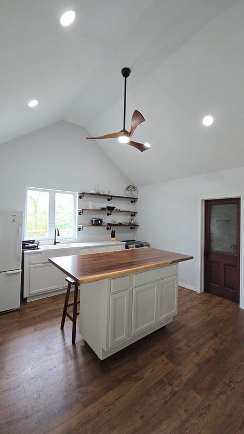 Valted celing kitchen with live edge counter top