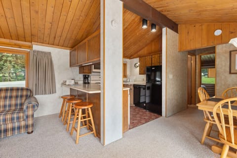 This well-equipped kitchen and dining space allows for family meals and memories to be made together.