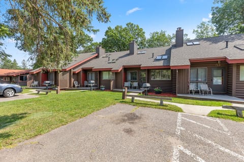 Exterior view of cabin row with easy parking access.