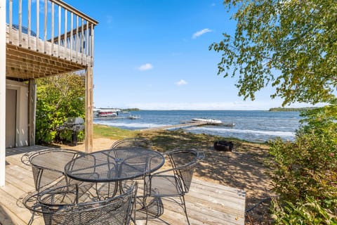 Outdoor patio with seating, perfect for lakeside relaxation.