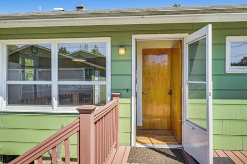 House Exterior | Back Door | Deck w/ Picnic Table | Charcoal Grill