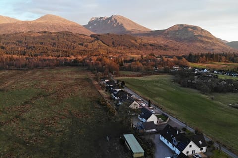 Highwinds bottom right with Ben Nevis in the background with fields front & back