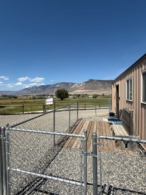 Private entry with fenced yard area for pets