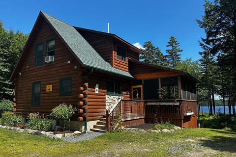Full log cabin with mini split heat pump for heating and cooling.