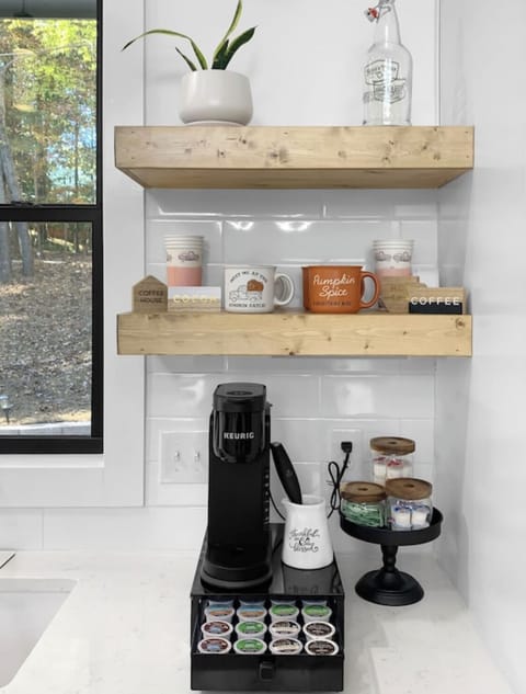 Start your day at the coffee bar w/ Keurig, K-Cups, creamers & full mug set.