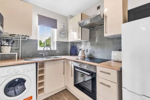 A fully equipped kitchen stocked with all the essentials you need to prepare and enjoy a home-cooked meal during your stay.