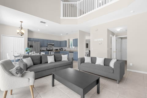 High ceilings and lots of natural light in the open concept living area