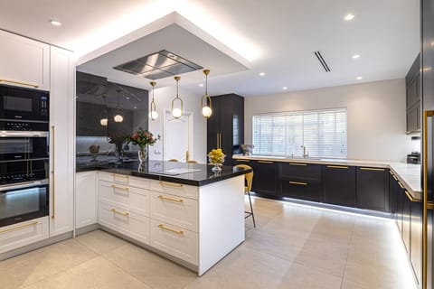 Spacious double kitchen designed for private chefs and seamless event hosting