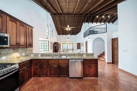 You'll love the open layout with vaulted ceilings and charming loft stairs.
