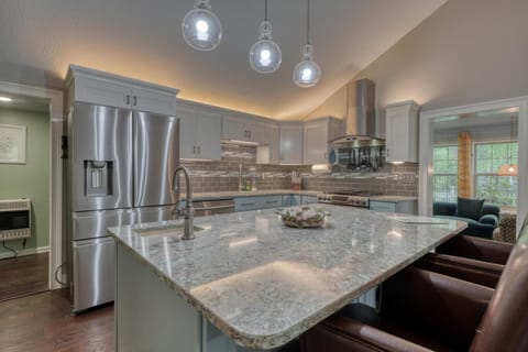 Modern kitchen and a spacious island for gathering.