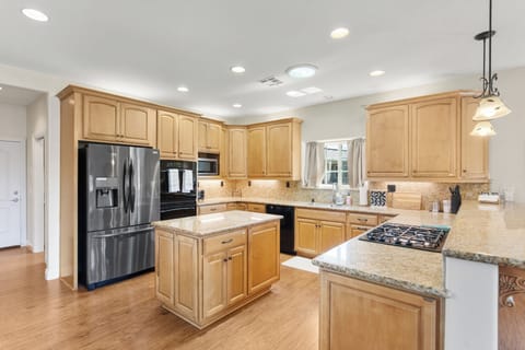Large kitchen with plenty of storage.