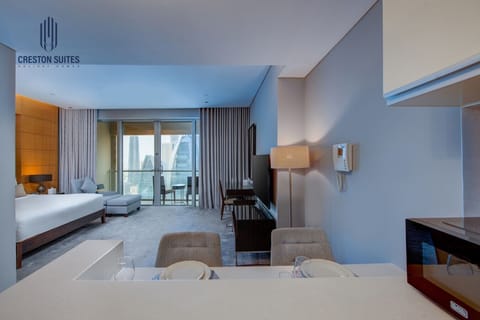 The kitchen and dining area layout and furnishings may vary slightly between rooms, yet each offers a stylish, comfortable, and well-appointed setting for your stay