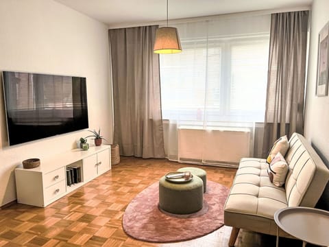 Furniture, Interior Design, Flooring, Floor, Wall, Couch, Room, Wood, Living Room, Window Covering