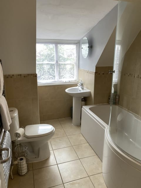 Bath with shower over.