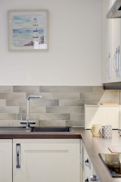 Utility room with Washing machine and laundry area