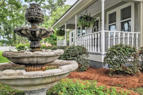 Tranquil fountain by front porch expansive