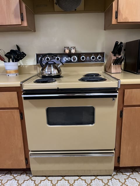 Fully stocked kitchen with charming vintage touches