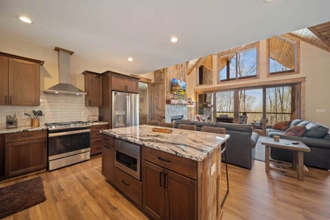 Kitchen with Center Island and Granite Counters