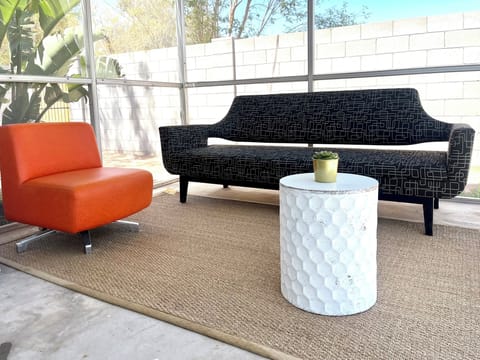 Screened patio is adjacent to pool, and is very relaxing. Perfect for a drink.