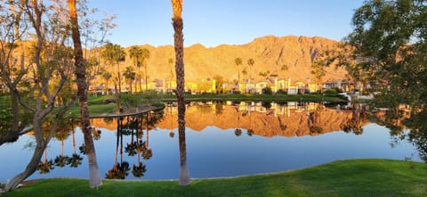 Sunrise view of the mountains & lake from back patio