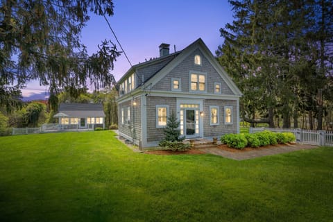 Evening view of the property's front exterior