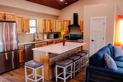 Large well equipped kitchen and sitting area