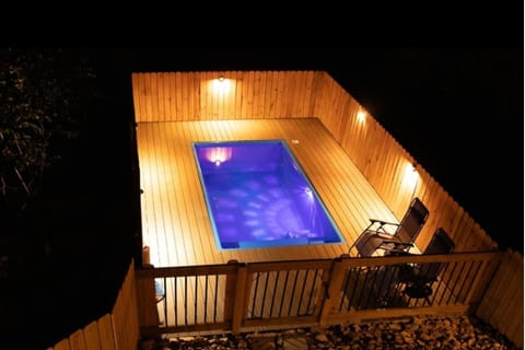 A private heated pool (operated mid March - mid Nov) tucked inside the nature