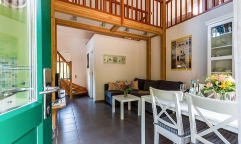 Living Room with Sofa and Dining Table