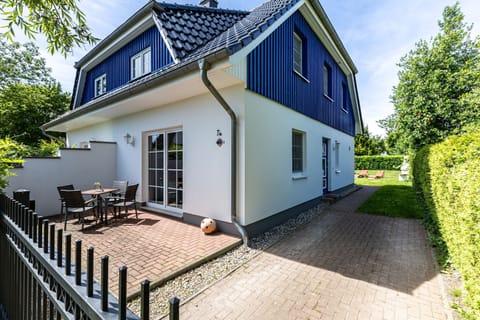 Terrace with Dining Area and Garden View
