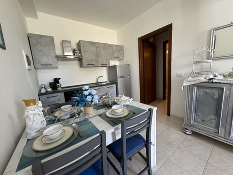 Furniture, Flooring, Interior Design, Floor, Chair, Table, Room, Apartment, Kitchen & Dining Room Table, Major Appliance