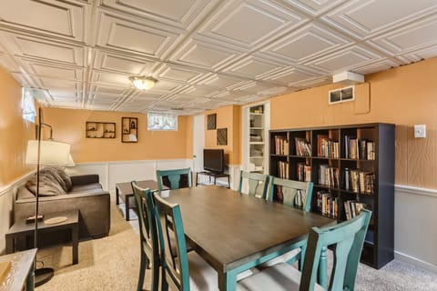 Spacious living room featuring a smart TV and couch