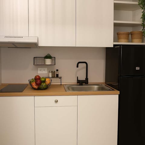 Fully equipped kitchen with all essentials for your stay.