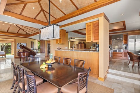 Dining table for eight with view-facing placement—enhance every meal with beauty and ambiance.