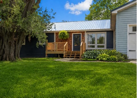 Charming single level home surrounded by mature trees