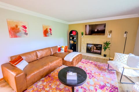 Welcome to your cozy living room retreat — perfect for relaxing and recharging!