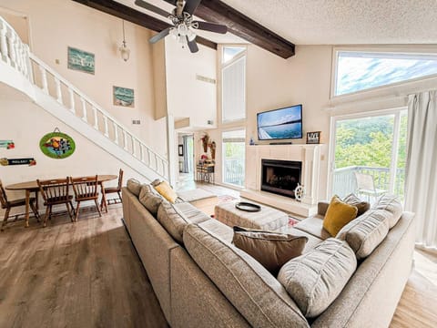 Your perfect gathering spot! Enjoy the open layout of our living room, complete with a fireplace and plenty of space to make memories.