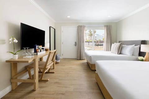 Unit with 2 Full beds. Exact unit will be assigned upon arrival. Views, colors, and decor may vary.