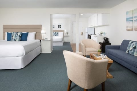 Unit with 1 King bed and 1 Queen bed. Exact unit will be assigned upon arrival. Views, colors, and decor may vary.